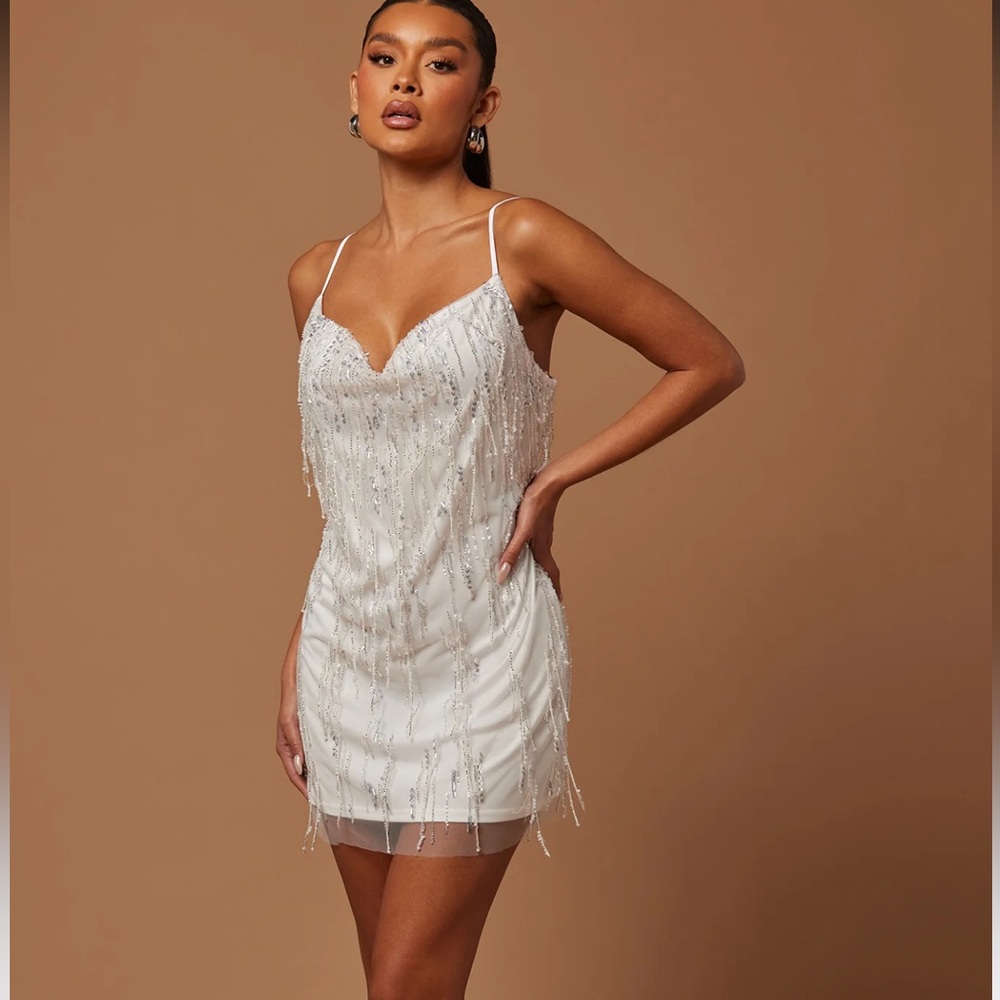Isabelle sequin mini dress in white.